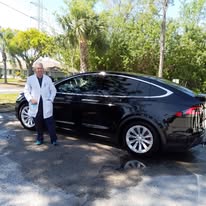 Freshly detailed black Tesla Model X looking brand new